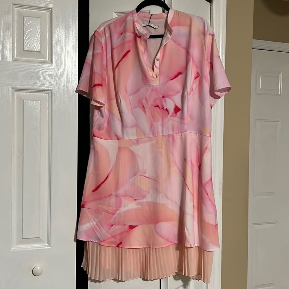Beautiful mini pink dress, with buttons and short sleeves. Double layers new!